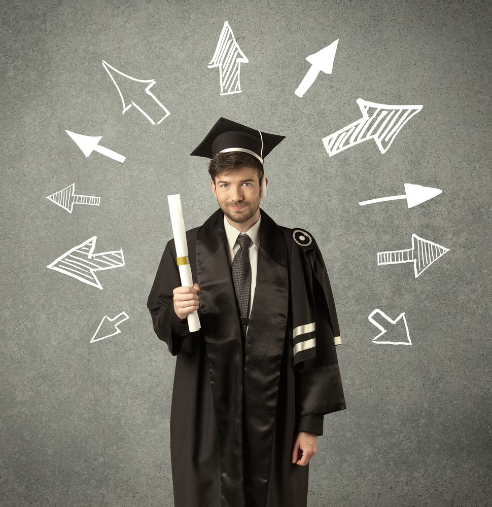 Young graduate student with hand drawn arrows on wall